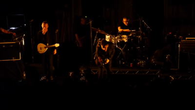 The Specials begin to perform "Rat Race" when an audience member throws a can onto the stage. Lead singer Terry Hall stops the performance, swears at the audience member and has security throw him out. He then points out how it would not be acceptable for him to visit B&Q tomorrow and throw a can at the girl on the checkout. He finally expresses a desire to leave early in order to have time to get some food, pleasure himself and watch Match of the Day.